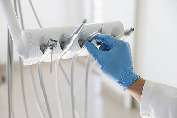 Professional Tooth Extraction technician working in Burbank, WA
